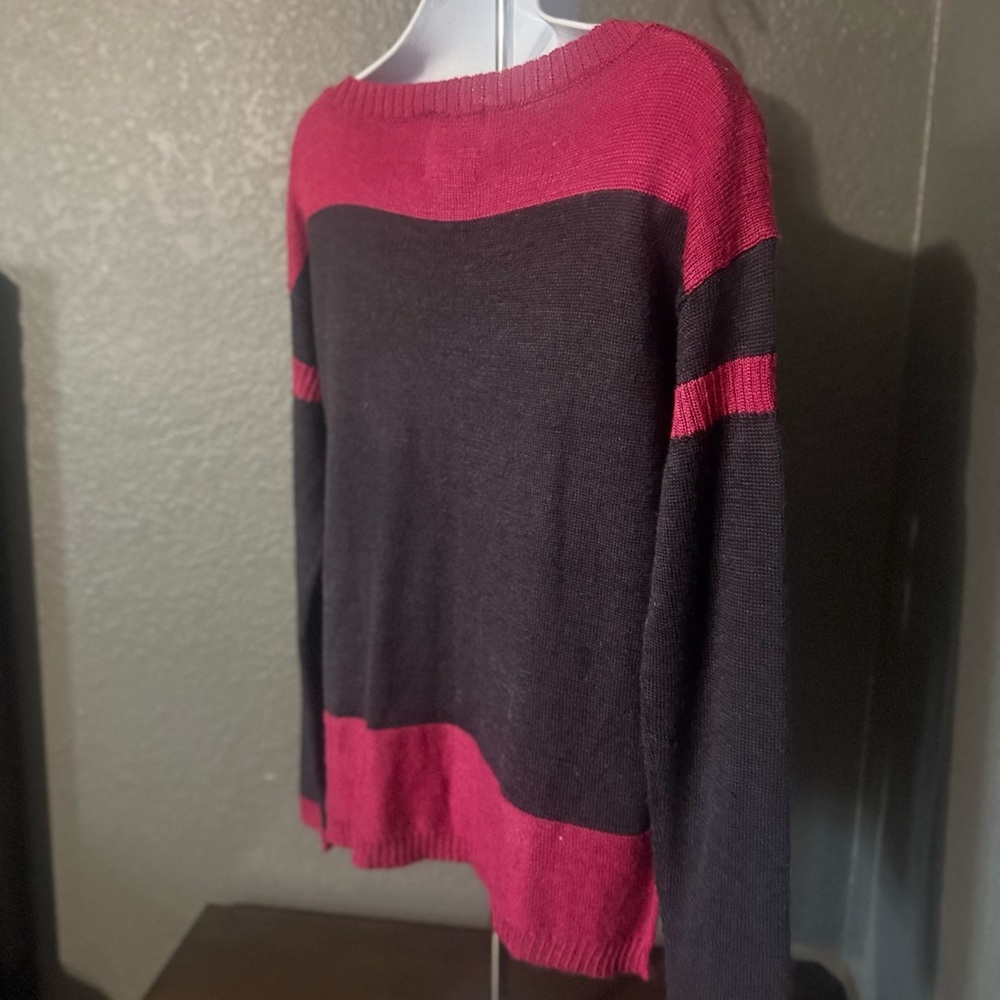 Burgundy and black sweater color block. Small slits on side. Like new condition.
